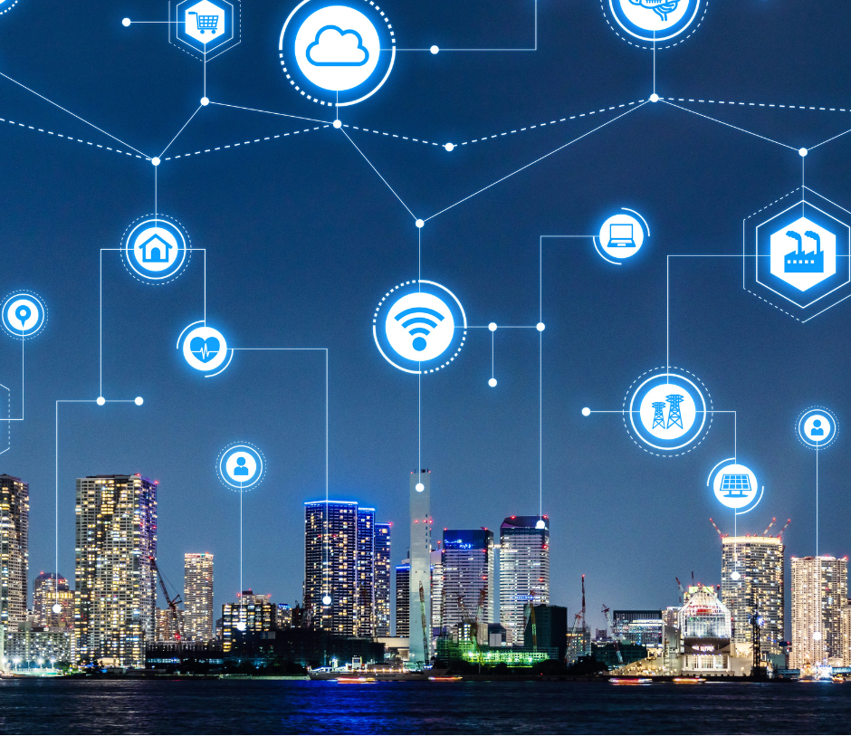 City skyline with digital icons and connections against a dark blue sky